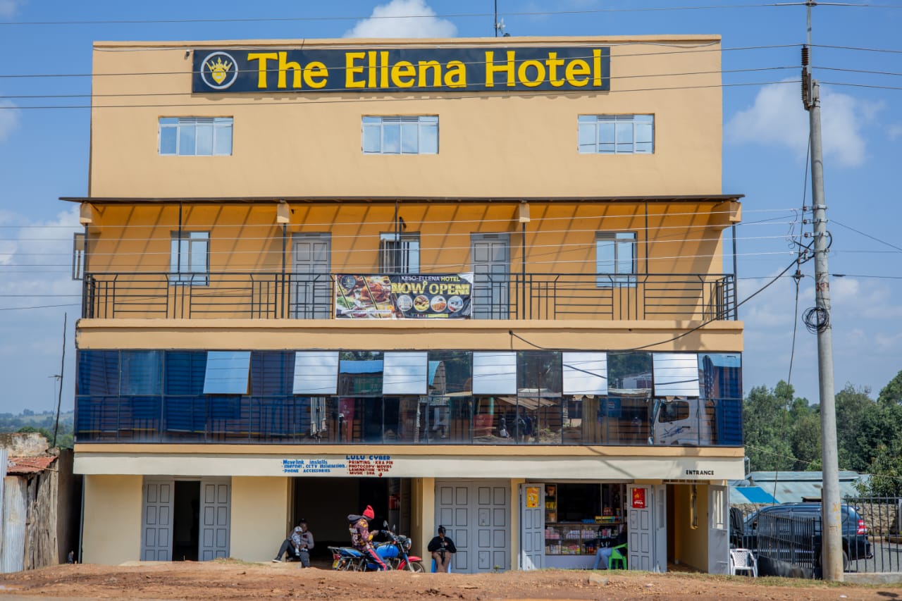 The Ellena Hotel — three-storey yellow façade on the Kitale–Kapenguria Road